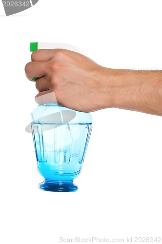 Image of Hand with spray bottle