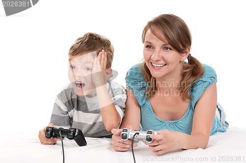 Image of Happy family playing a video game