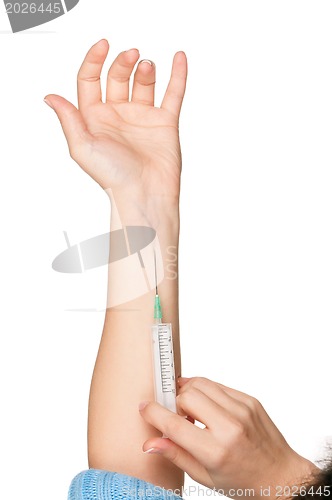 Image of Hand with syringe