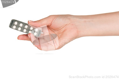 Image of Hand with pills