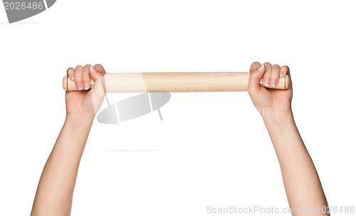 Image of Hand with rolling pin