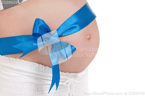 Image of Pregnant belly with blue ribbon