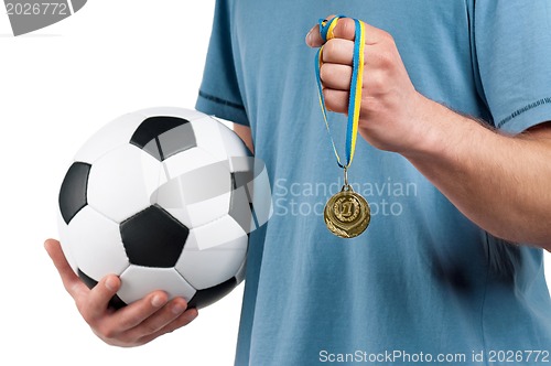 Image of Man with classic soccer ball