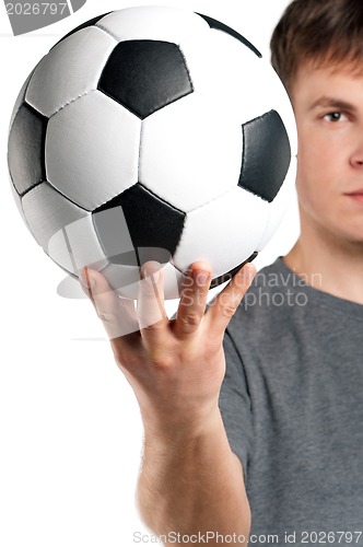 Image of Man with classic soccer ball