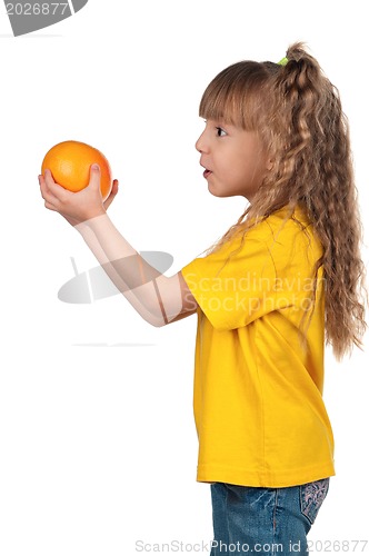 Image of Little girl with grapefruit