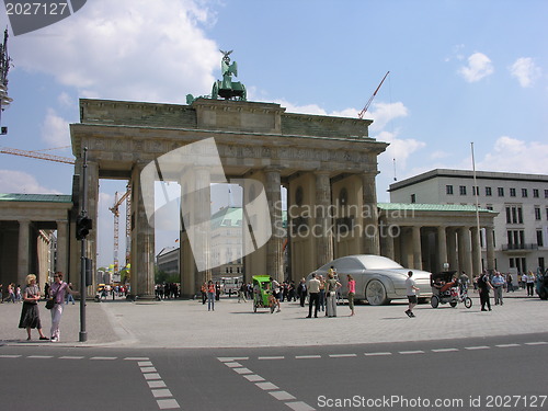 Image of BERLIN - MAY 20: Tourists walk in front of Brandenburg Gate, May