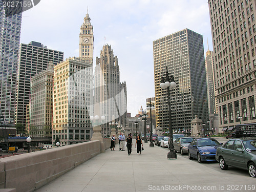 Image of CHICAGO - AUG 5: Tourists walk in downtown streets, August 5, 20