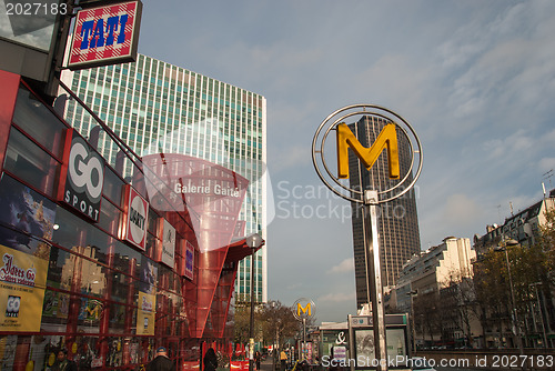 Image of PARIS - DEC 9; Street picture with a M (metro) sign in the Montp