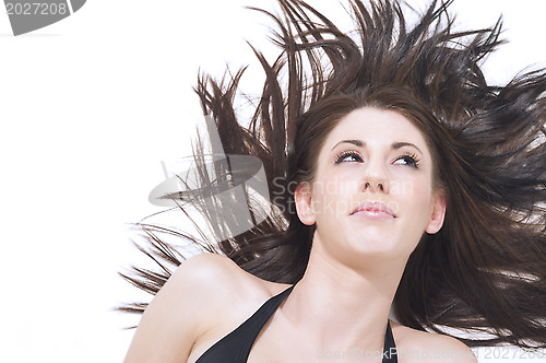 Image of Beautiful woman with windblown hair