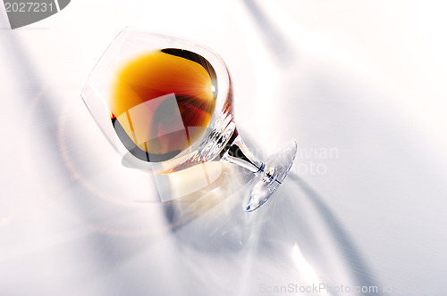 Image of Rich brown aged cognac in elegant snifter