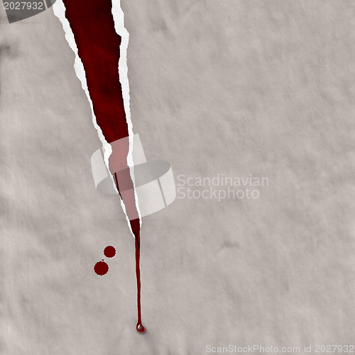 Image of ripped paper with blood