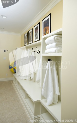 Image of locker room with bathrobes towels