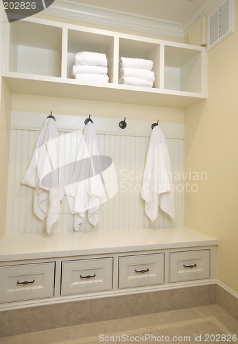 Image of locker room with bathrobes towels