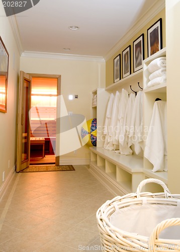 Image of locker room with bathrobes towels