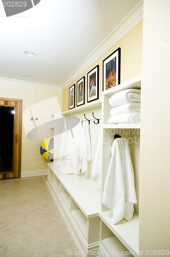 Image of locker room with bathrobes towels