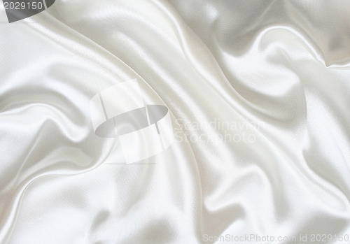 Image of Smooth elegant white silk as background 