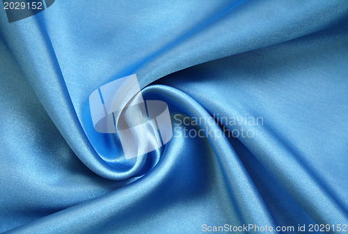 Image of Smooth elegant blue silk as background