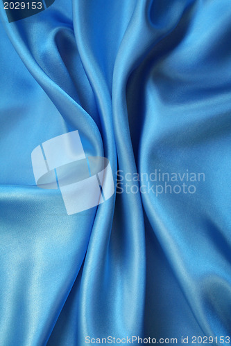 Image of Smooth elegant blue silk as background