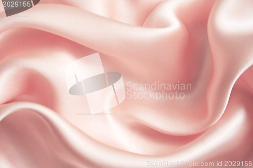 Image of Smooth elegant pink silk as background 