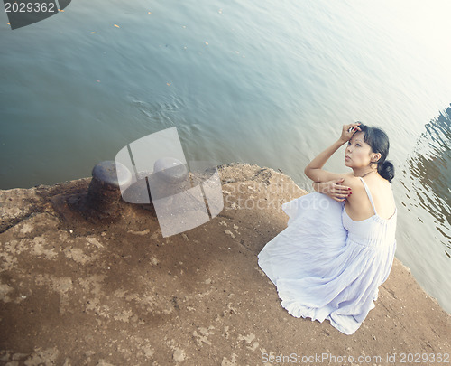 Image of Lady at the wharf