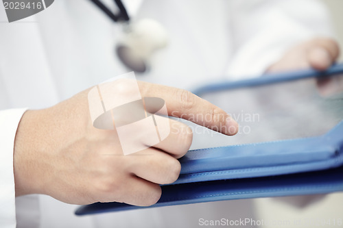 Image of Doctor with tablet computer