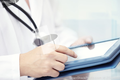 Image of Doctor with tablet computer