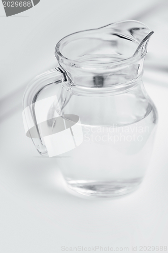 Image of Glass can with water