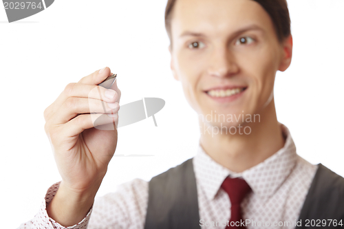 Image of Businessman is writing on a virtual whiteboard