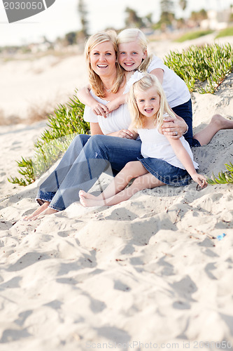 Image of Pretty Mom and Her Cute Daughters at The Beach