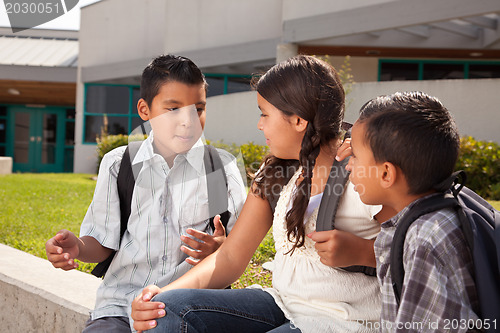 Image of Cute Brothers and Sister Talking, Ready for School