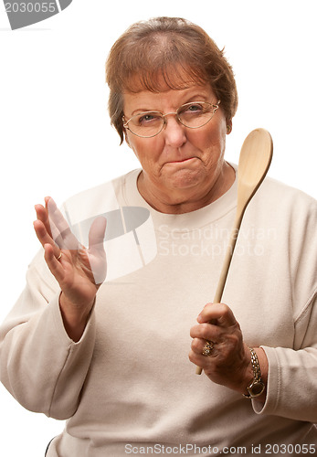 Image of Upset Senior Woman with The Wooden Spoon