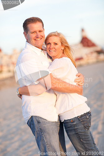 Image of Attractive Caucasian Couple Hugging at the Beach