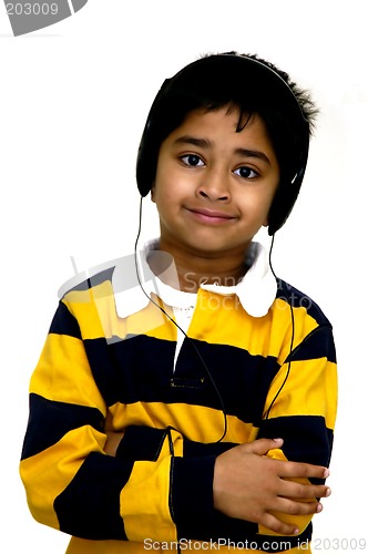 Image of Kid enjoying music