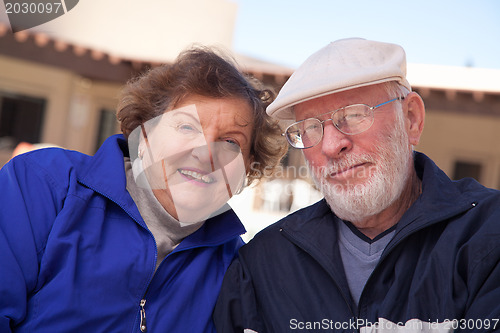 Image of Happy Senior Adult Couple Bundled Up Outdoors
