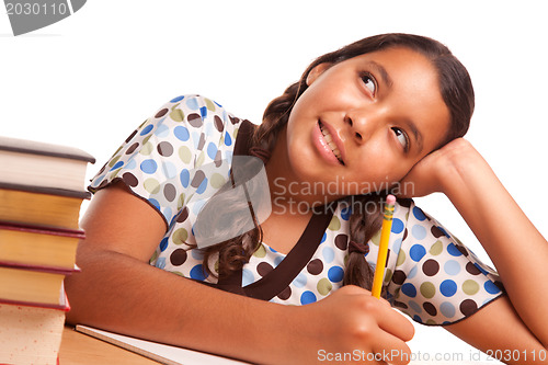 Image of Pretty Hispanic Girl Studying and Daydreaming