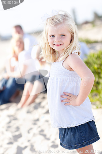 Image of Adorable Little Blonde Girl Having Fun At the Beach