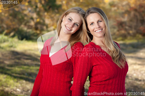 Image of Pretty Mother and Daughter Portrait in Park