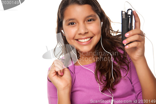 Image of Pretty Hispanic Girl Listening and Dancing to Music