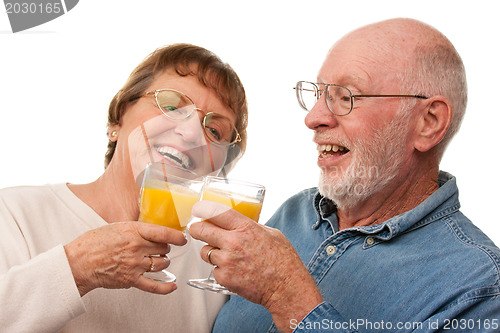 Image of Happy Senior Couple with Glasses of Orange Juice