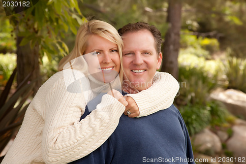 Image of Happy Attractive Caucasian Couple in the Park