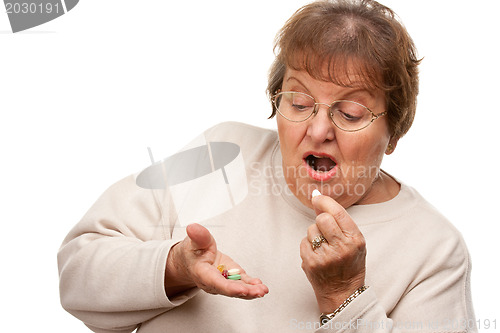 Image of Attractive Senior Woman and Medication Pills
