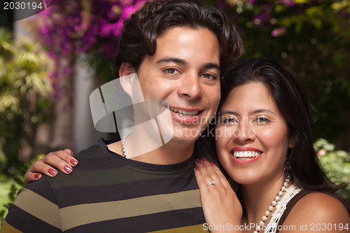 Image of Happy Attractive Hispanic Couple At The Park