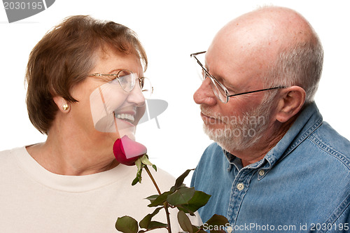 Image of Happy Senior Husband Giving Red Rose to Wife