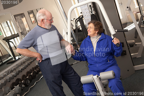 Image of Senior Adult Couple Working Out Together in the Gym