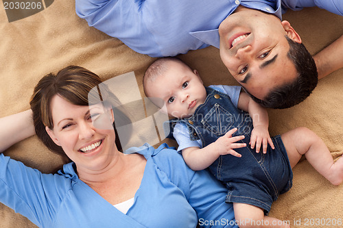 Image of Mixed Race Family Playing on the Blanket