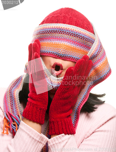 Image of Attractive Woman With Colorful Scarf Over Eyes