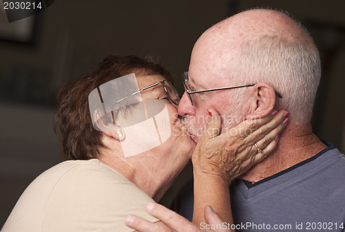 Image of Happy Senior Couple Kissing