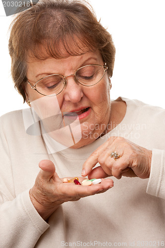 Image of Attractive Senior Woman and Medication Pills
