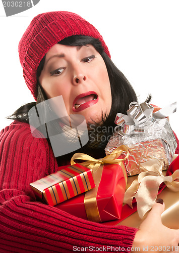Image of Attractive Woman Fumbling with Her Holiday Gifts