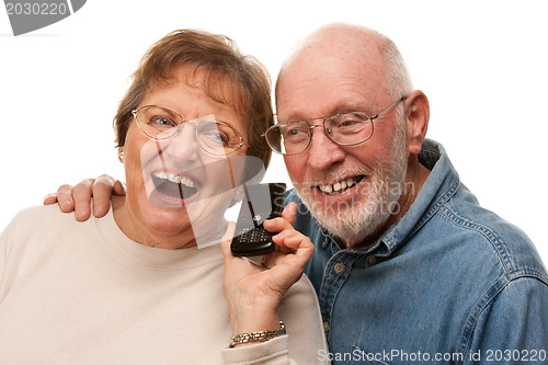 Image of Happy Senior Couple Using Cell Phone on White